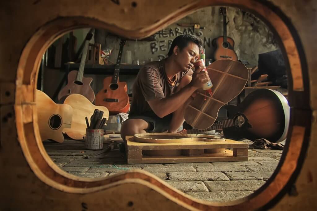 Man building a guitar