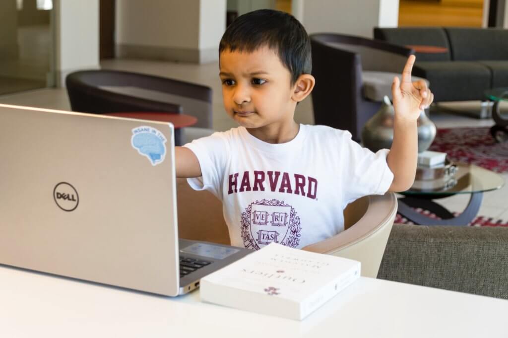 Child with Harvard Shirt